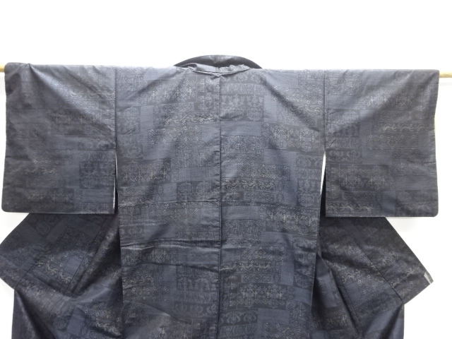  更紗模様織出し本場泥大島紬着物